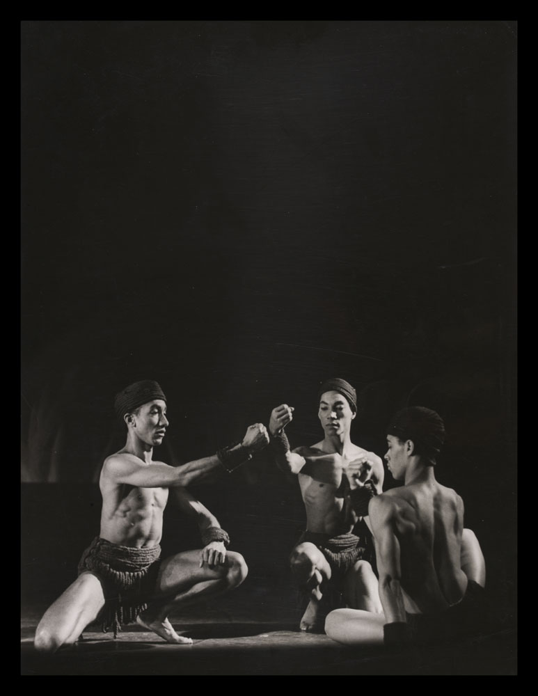 Black and white photograph of performers on stage in Rites de Passage- A Caribbean Rhapsody