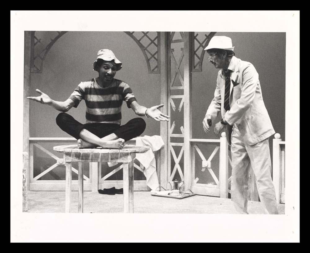 Black and white photograph of actors in Pantomime